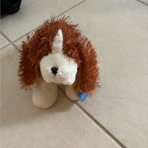 Brown and White Stuffed Dog Toy